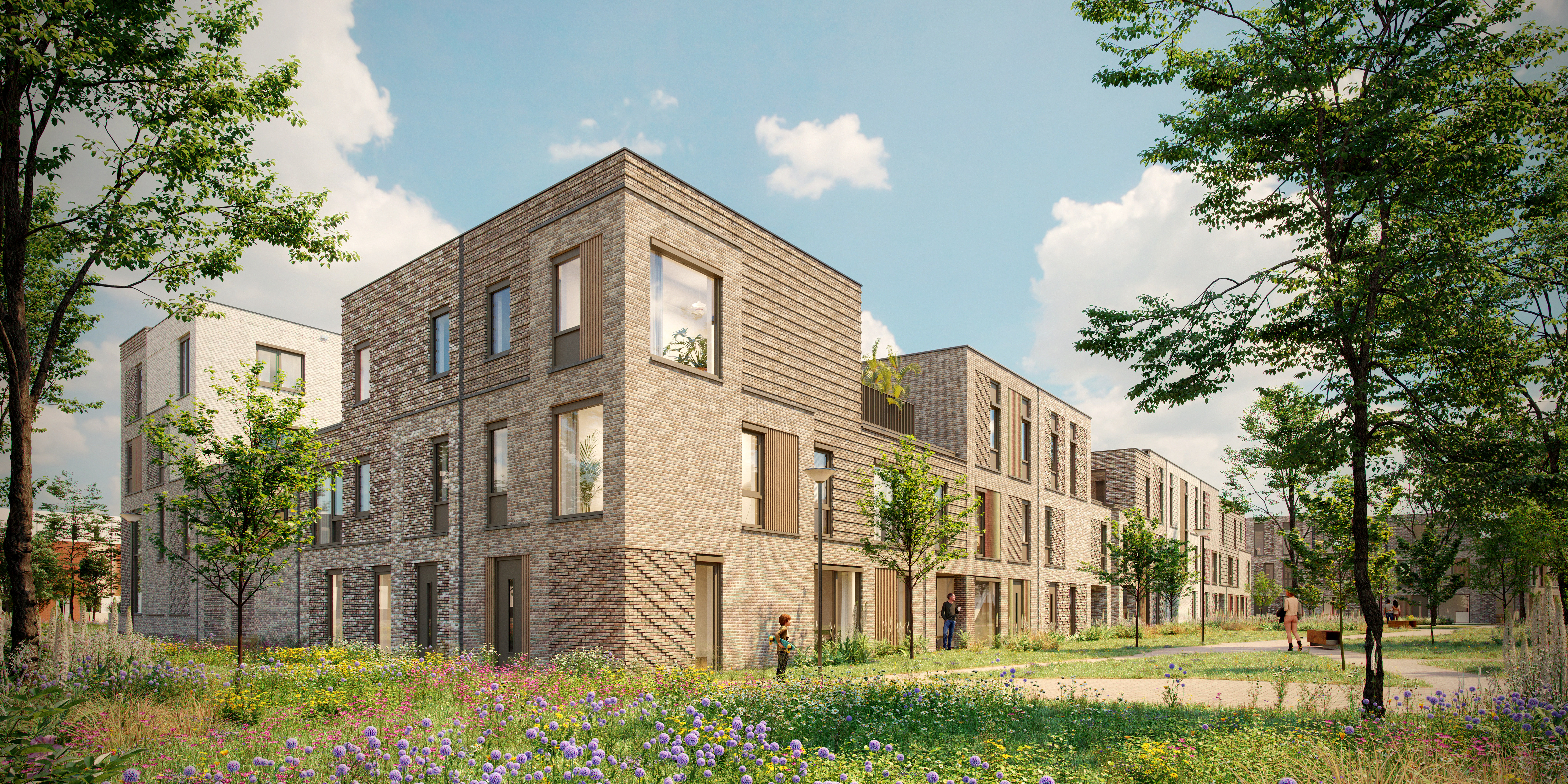 Parkzicht met bloemenweide en woningen